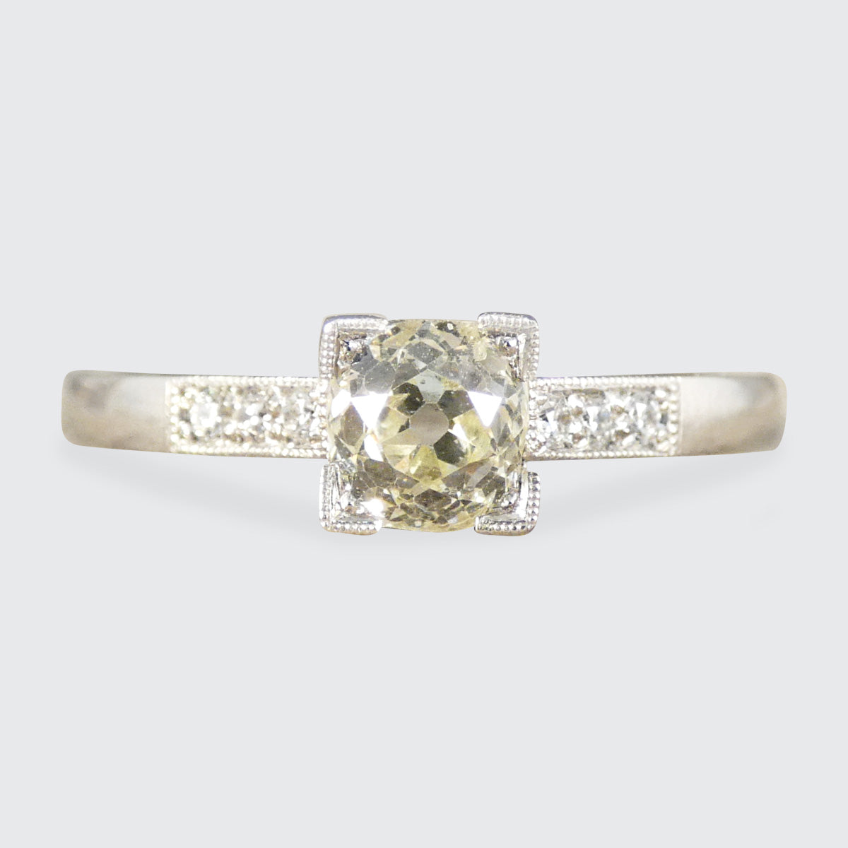 Champagne Old Cushion Cut Diamond Solitaire with Diamond set Shoulders in Platinum