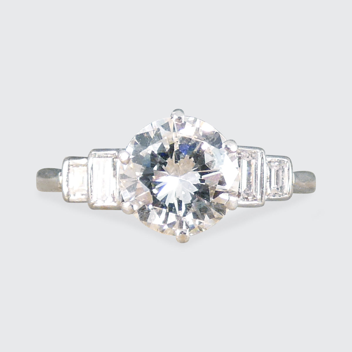 Art Deco 1.20ct Early Brilliant Cut Diamond Solitaire with Baguette Cut Shoulders in Platinum