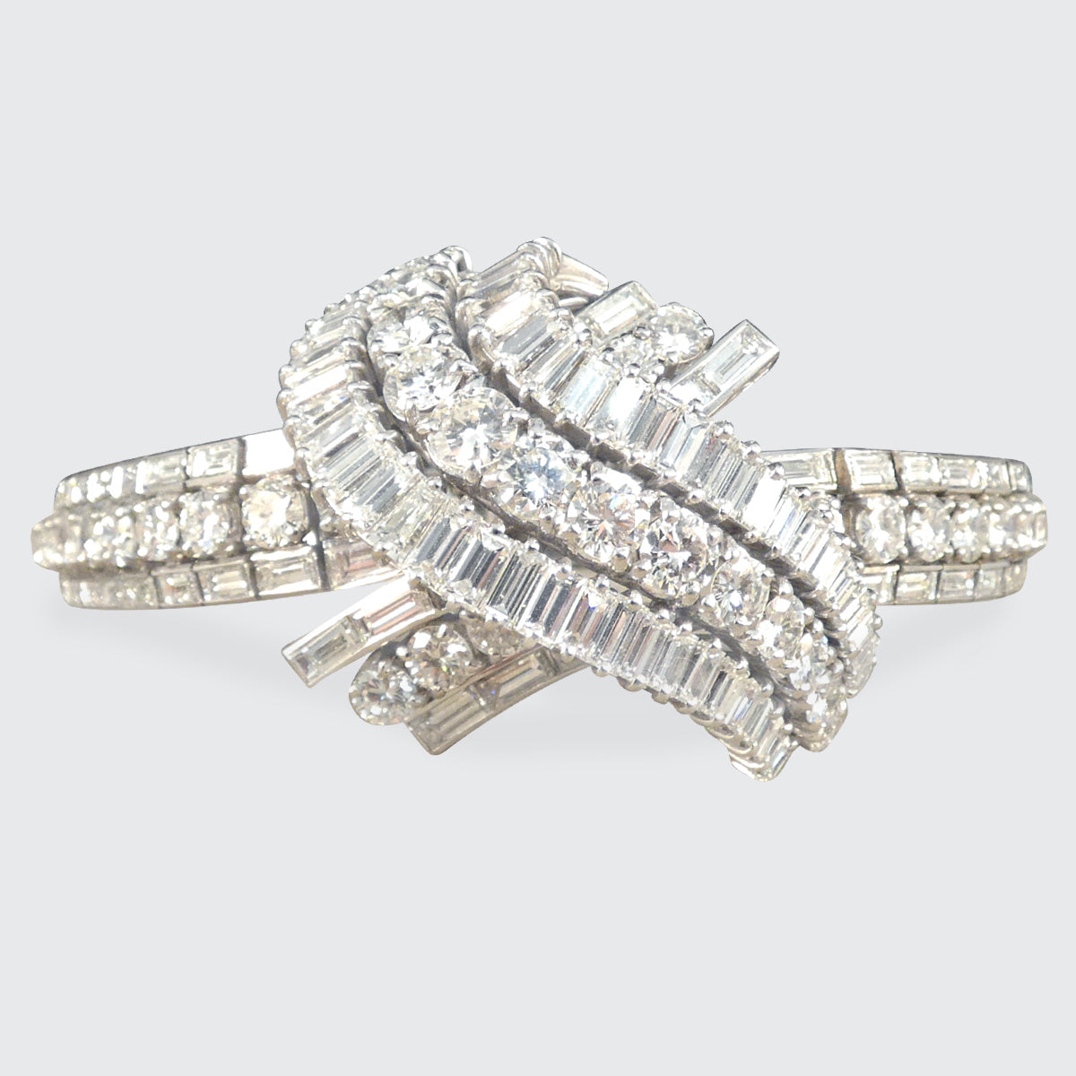 Elegant 1950's French diamond bracelet featuring approximately 30 carats of dazzling diamonds in a luxurious platinum setting, showcasing a sophisticated and timeless design.