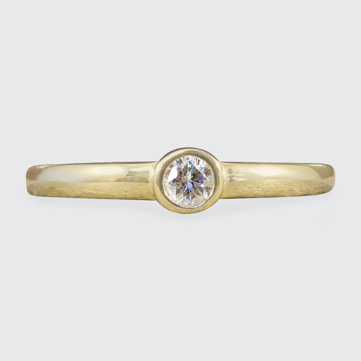 Diamond Single Stone Ring in Yellow Gold Bezel Setting