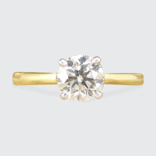 Front profile of Diamond Solitaire ring in a four claw setting in 18ct Yellow and White Gold