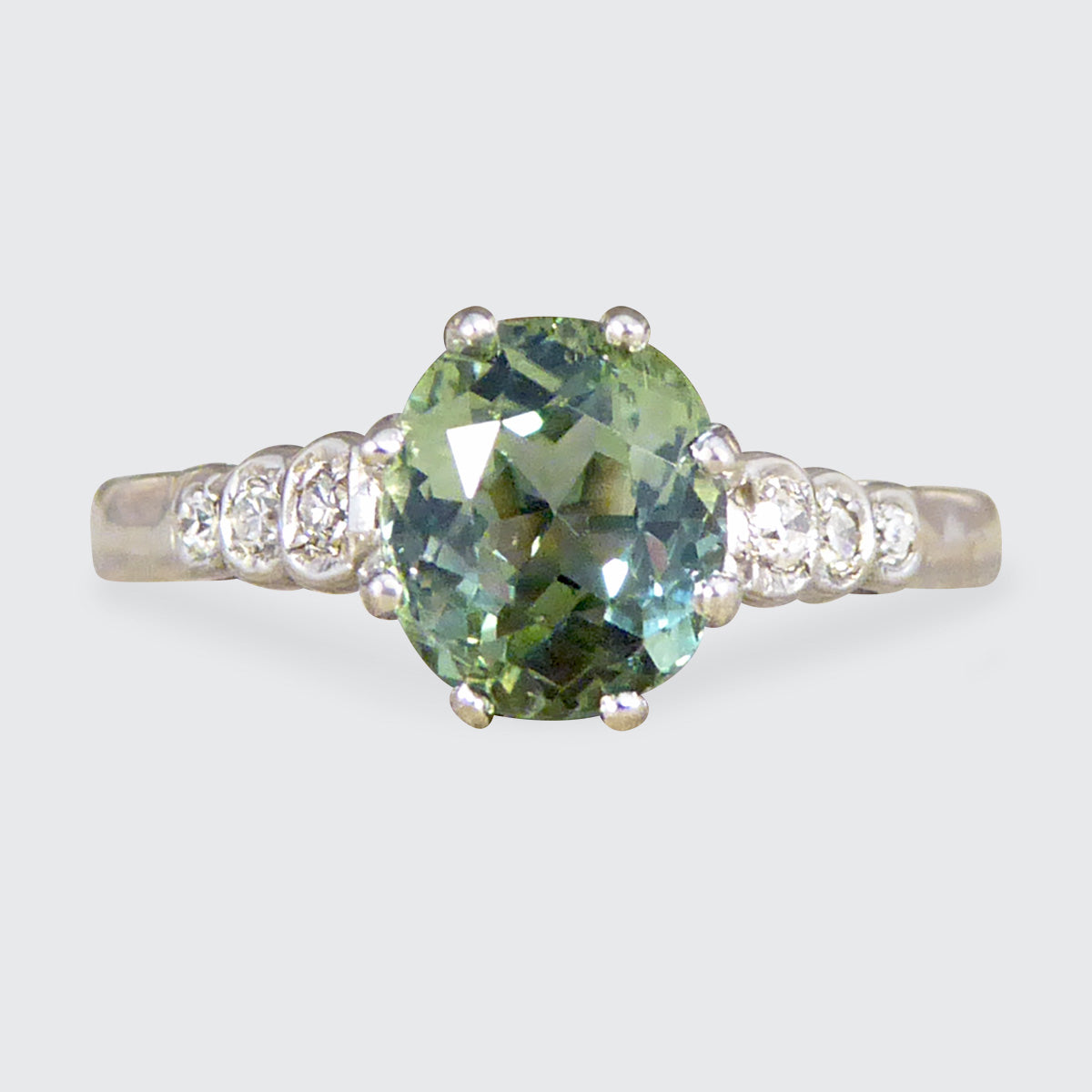 Enchanting Green Tourmaline Ring with Diamond Shoulders in 18ct White Gold