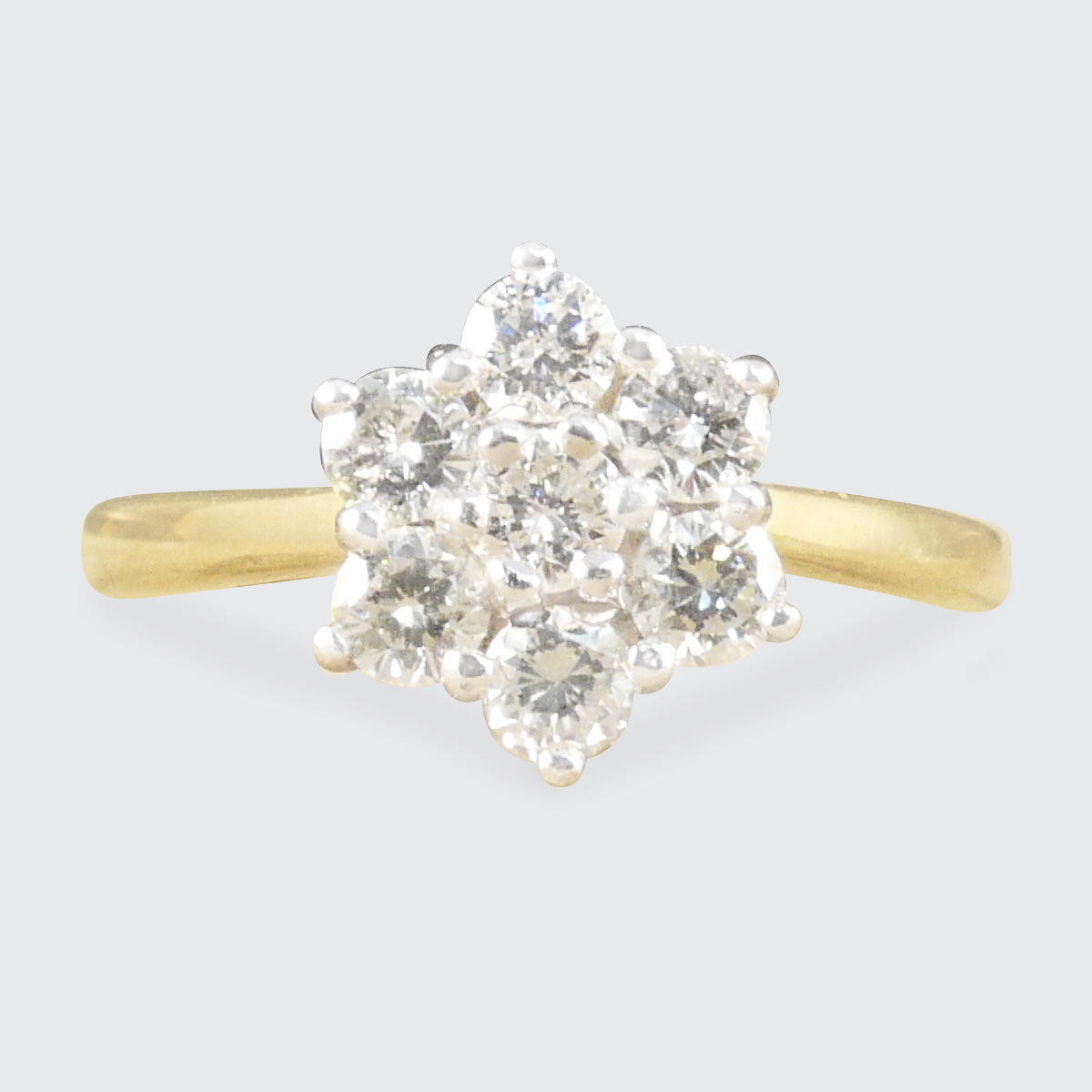 Vintage brilliant cut Diamond flower cluster ring in 18ct White and Yellow Gold. Gorgeous vintage engagement ring.