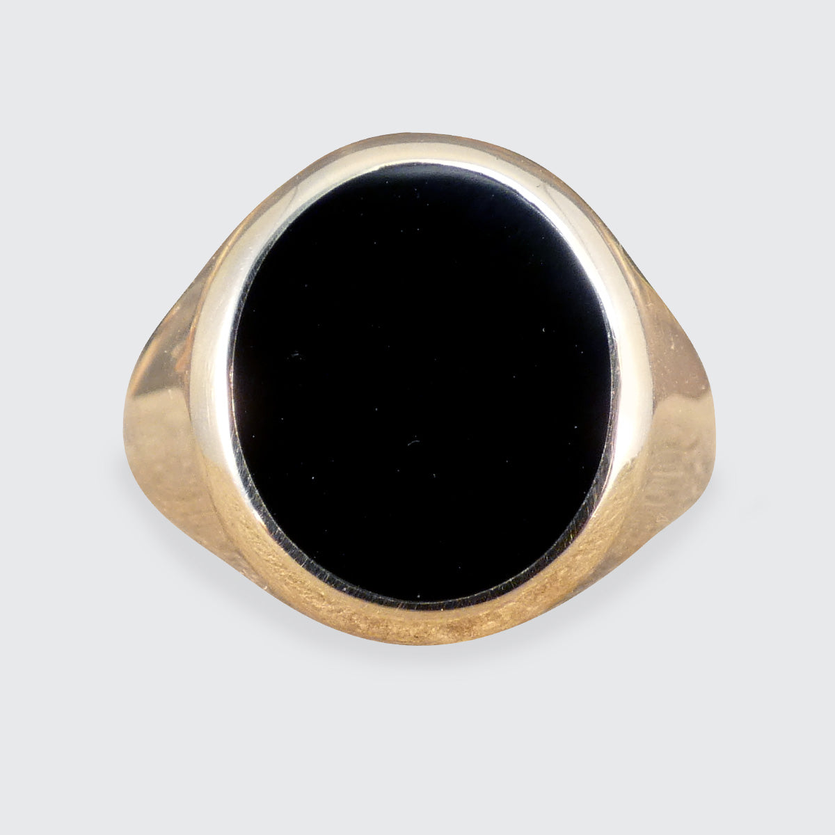 Oval Faced Onyx Set Signet Ring in 9ct Yellow Gold