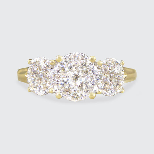 Oval Cut Diamond Three Stone Illusion Cluster Ring in Yellow Gold