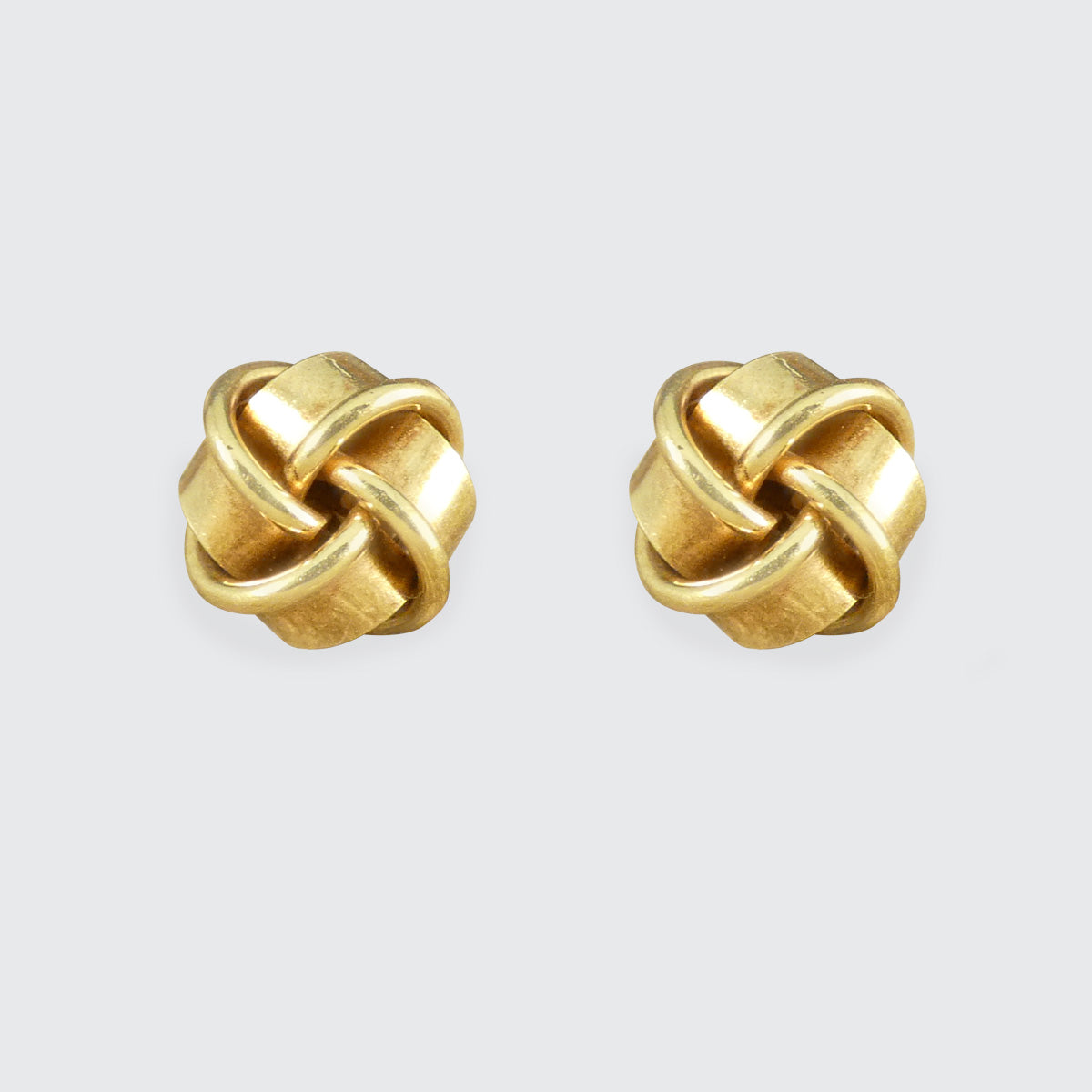 Elegant vintage knot earrings crafted in 9ct yellow gold. Featuring a timeless intertwined design, these classic earrings symbolise unity and sophistication, perfect for everyday wear or special occasions.