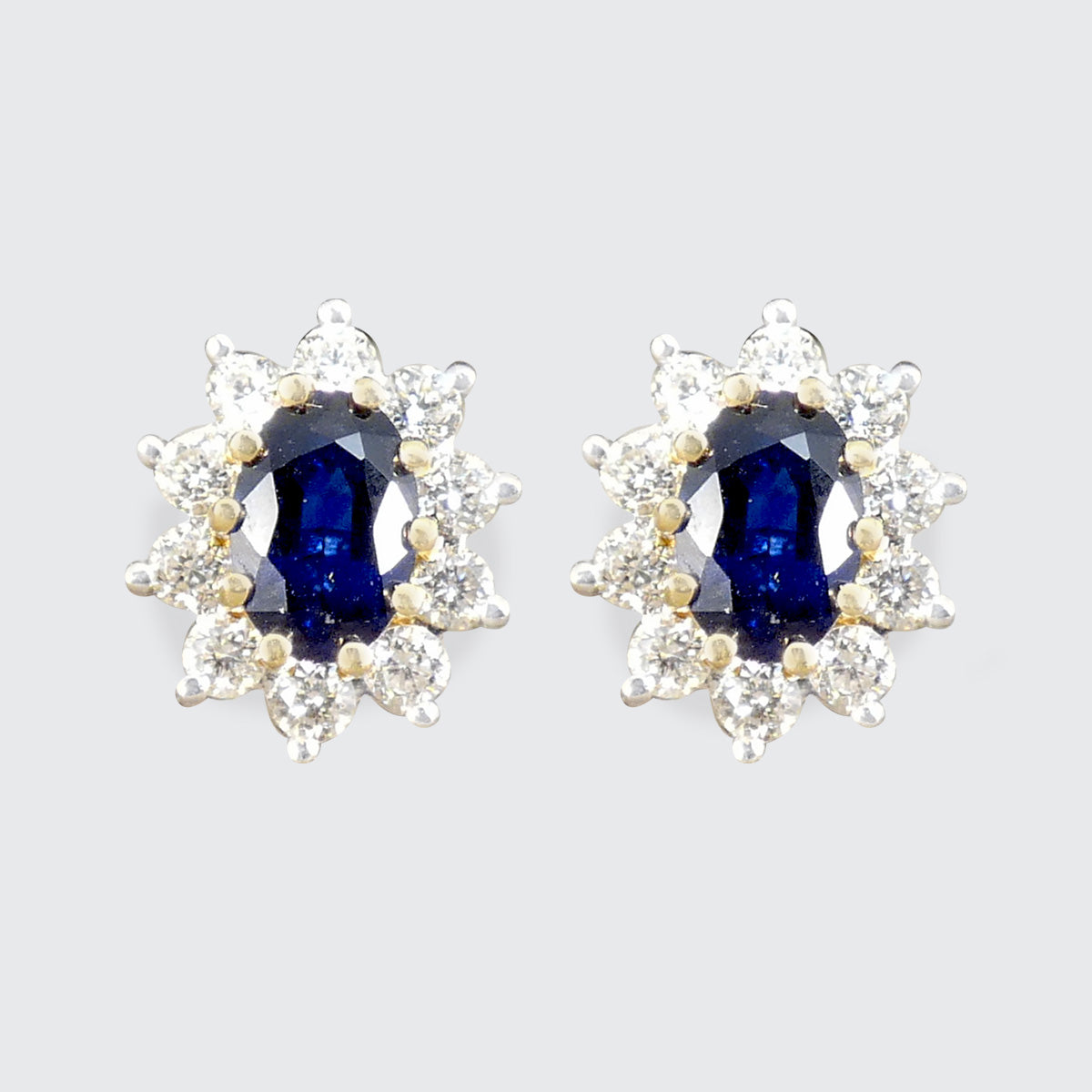 Classic Sapphire and Diamond cluster stud earrings in 18ct Yellow and White Gold.