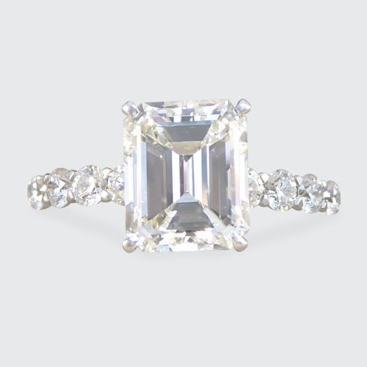 2.60ct Emerald Cut Diamond Solitaire Ring with 0.60ct Diamond Shoulders in Platinum