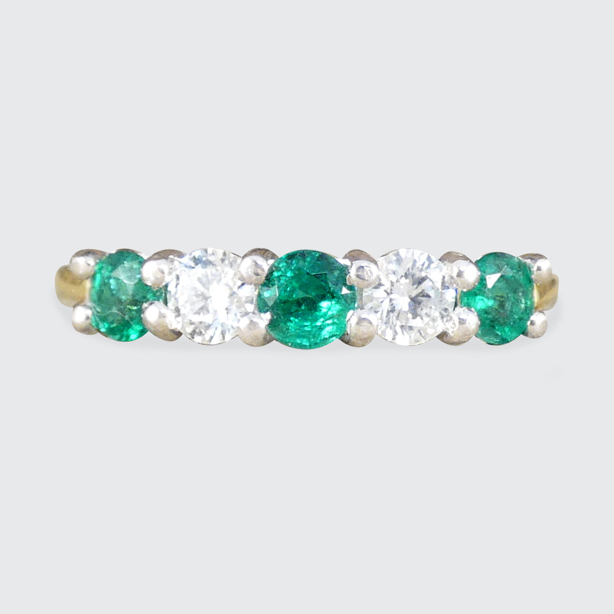 Emerald and Diamond Half Eternity five stone ring in 18ct white and yellow gold.