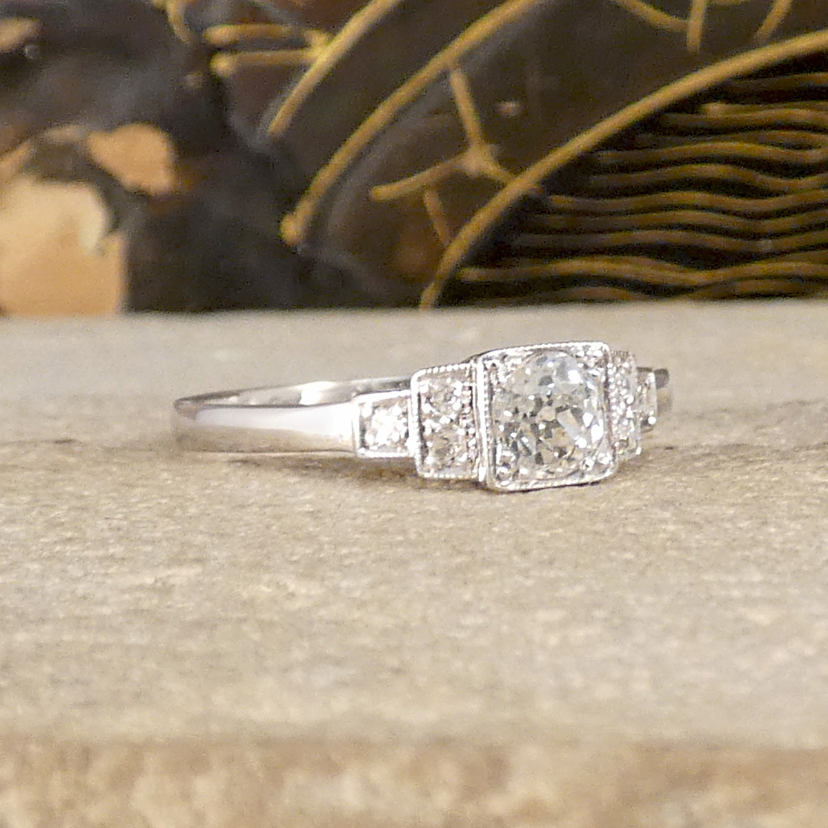 Vintage Art Deco Style Old Cut Diamond Ring with Diamond Staged Shoulders in Platinum. The perfect gift or engagement ring for anyone who likes a vintage beautiful piece.