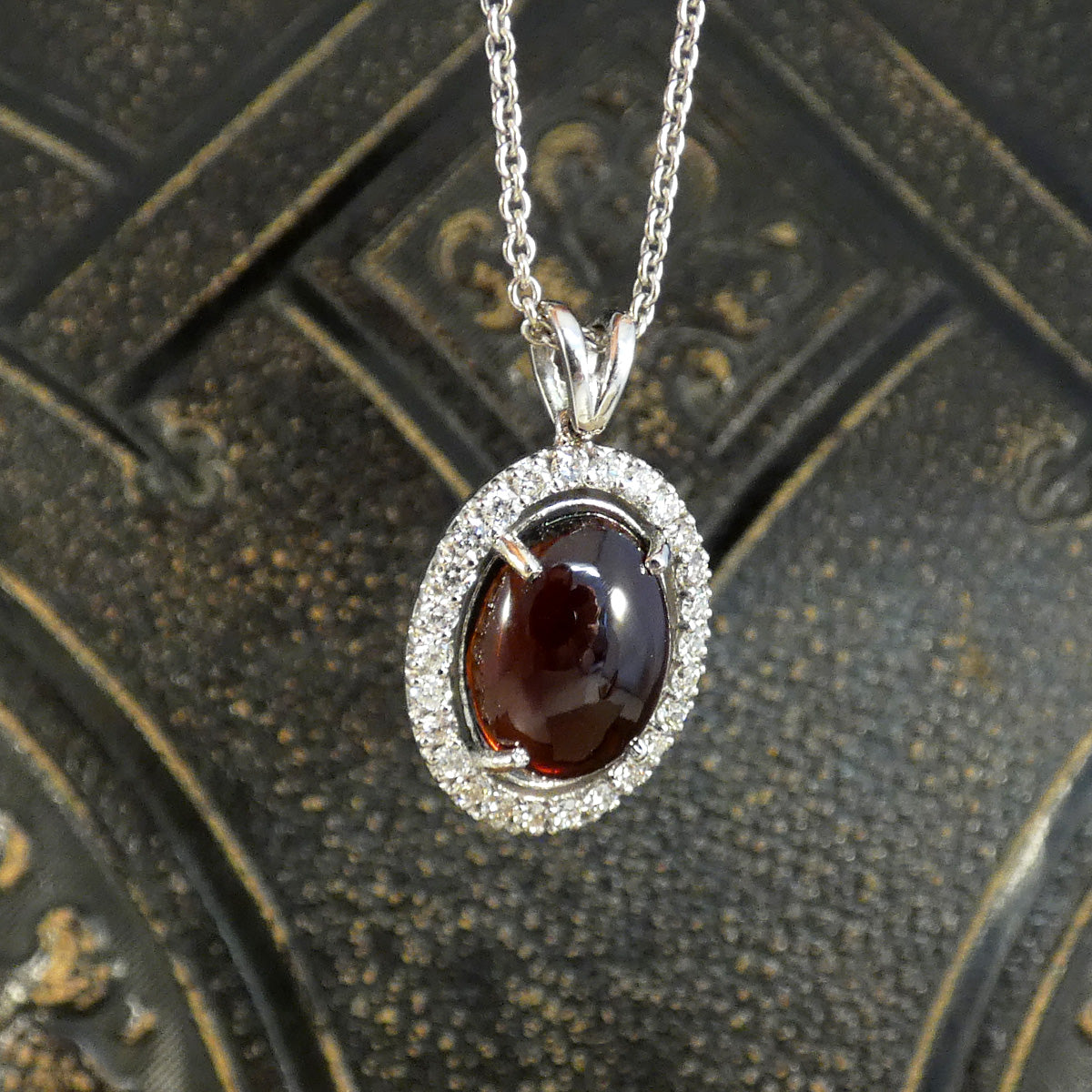 Cabochon Garnet and Diamond Halo Pendant Necklace in 18ct White Gold