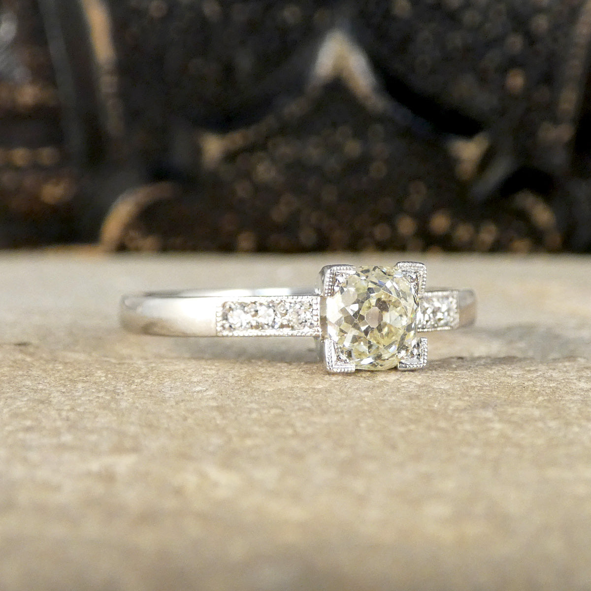 Champagne Old Cushion Cut Diamond Solitaire with Diamond set Shoulders in Platinum