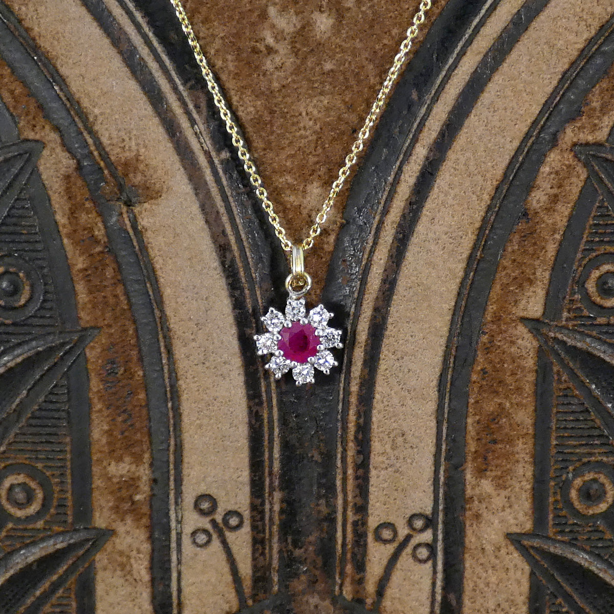 Ruby and Diamond Flower Cluster Pendant Necklace in 18ct Yellow and White Gold the perfect gift for birthday and anniversaries.