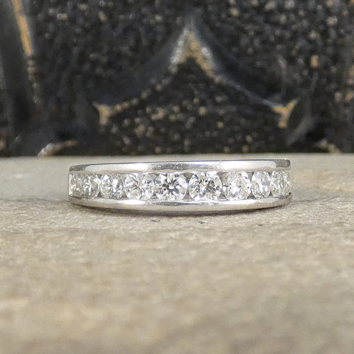 0.75ct Diamond Channel Set Half Eternity Ring in Platinum spreading half way around the finger making the perfect wedding ring and stackable ring.