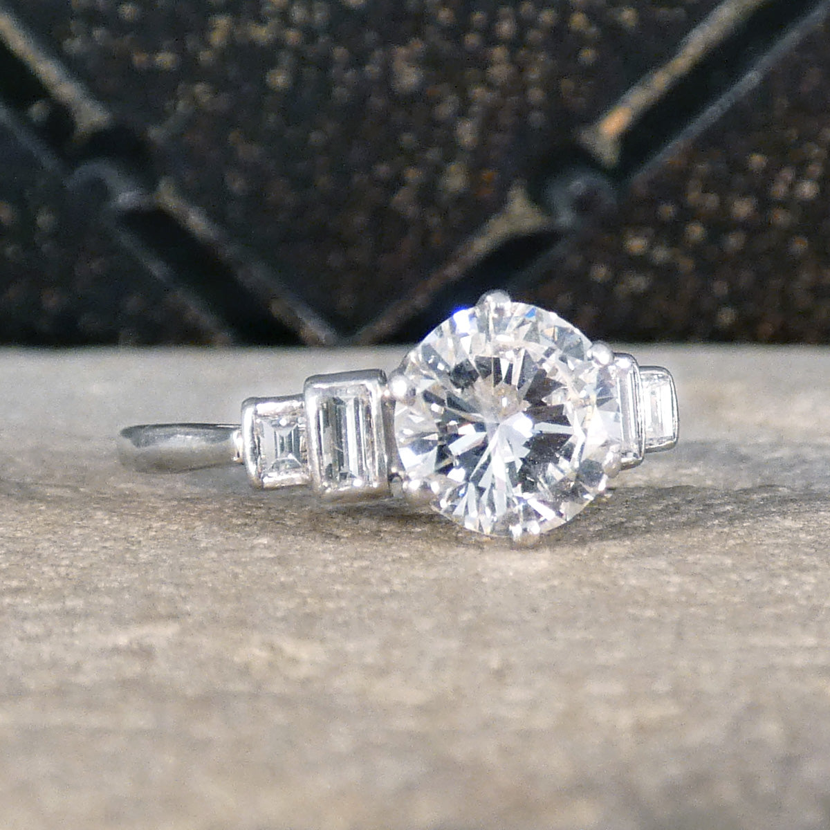 Art Deco 1.20ct Early Brilliant Cut Diamond Solitaire with Baguette Cut Shoulders in Platinum