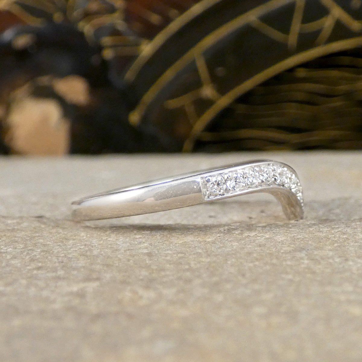 Side profile of Diamond set wishbone ring in 9ct White Gold.