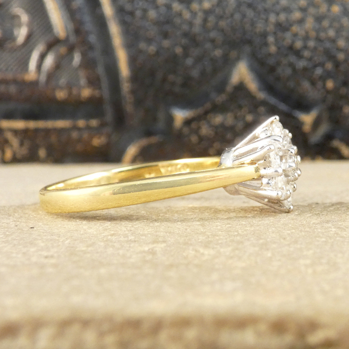 Vintage brilliant cut Diamond flower cluster ring in 18ct White and Yellow Gold. Gorgeous vintage engagement ring showing high white gold basket setting.