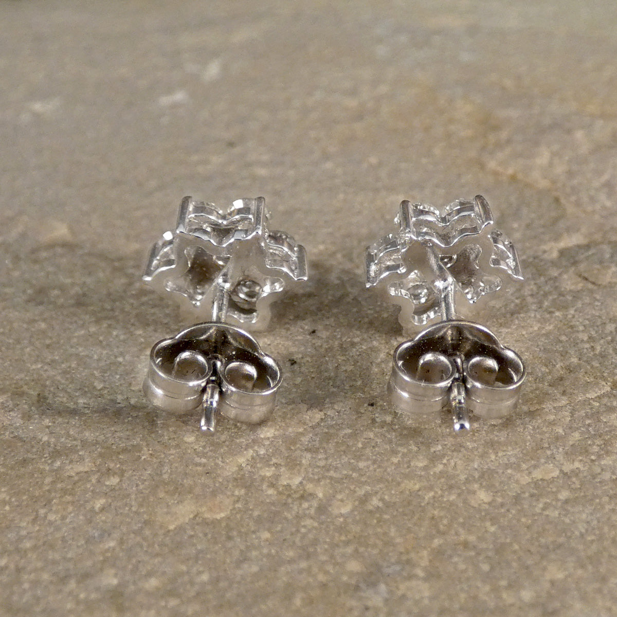 Back view of Daisy cluster earrings showing the secure butterfly backs.