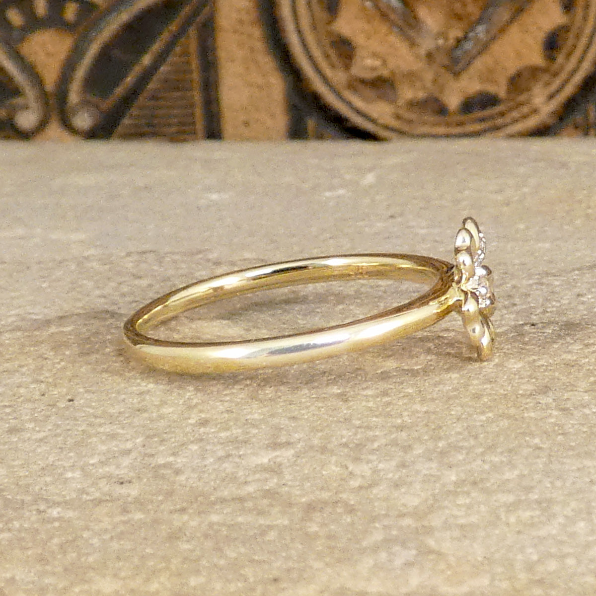 Side profile of Diamond set Daisy flower ring in 9ct Yellow Gold the perfect gift.