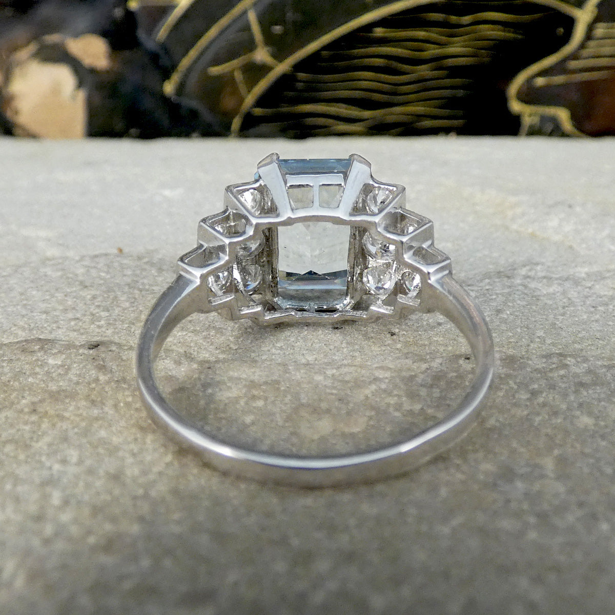 Back view of Art Deco style ring that has been newly crafted with a 3.00ct light blue Aquamarine with graduated staged set Diamond shoulders in Platinum. Showing open and simple gallery setting.