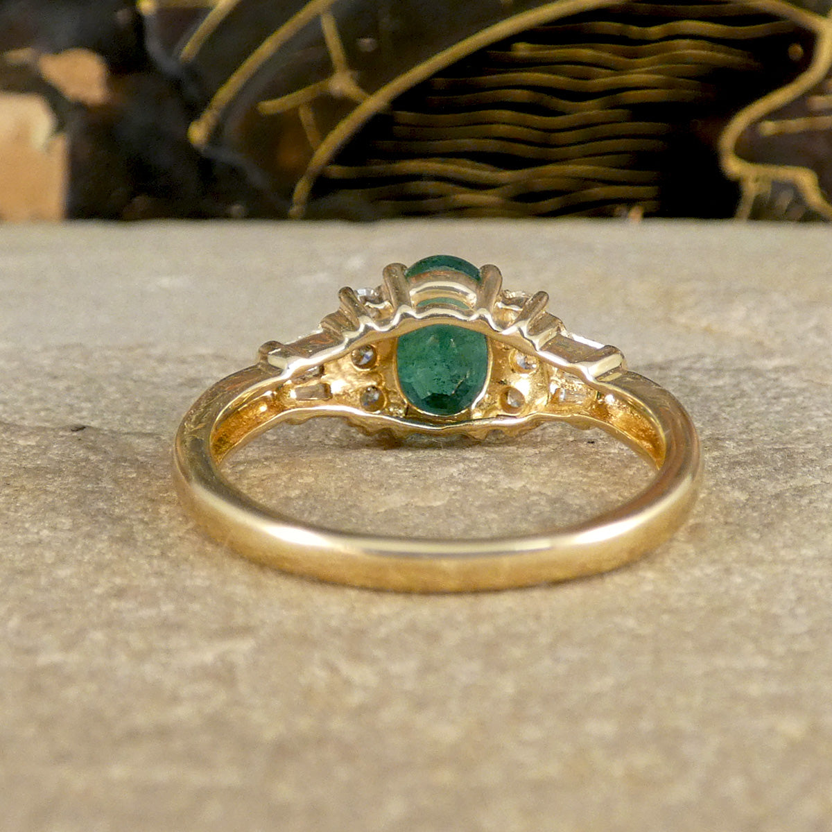 Emerald and Diamond ring view from the back of the setting showing the secure settings and plain polished band.