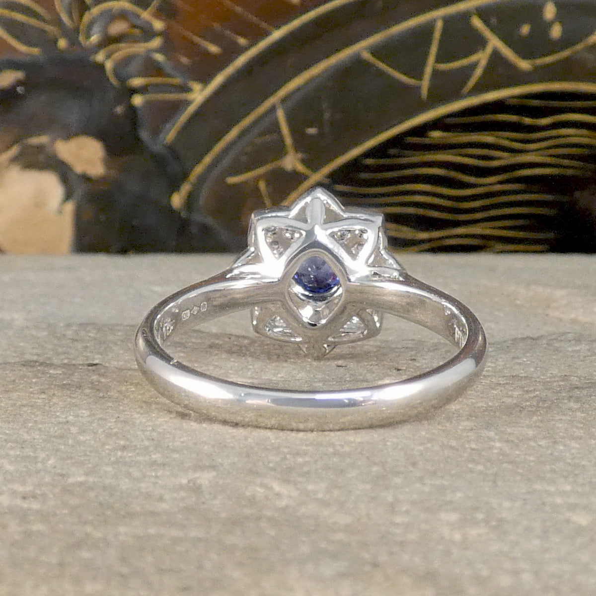 Back view of Sapphire and Diamond flower cluster ring with open back setting, allowing lots of light to pass through and sparkle.