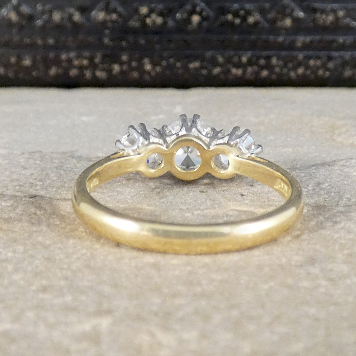 Back view of diamond three stone ring in 18ct white and yellow gold.