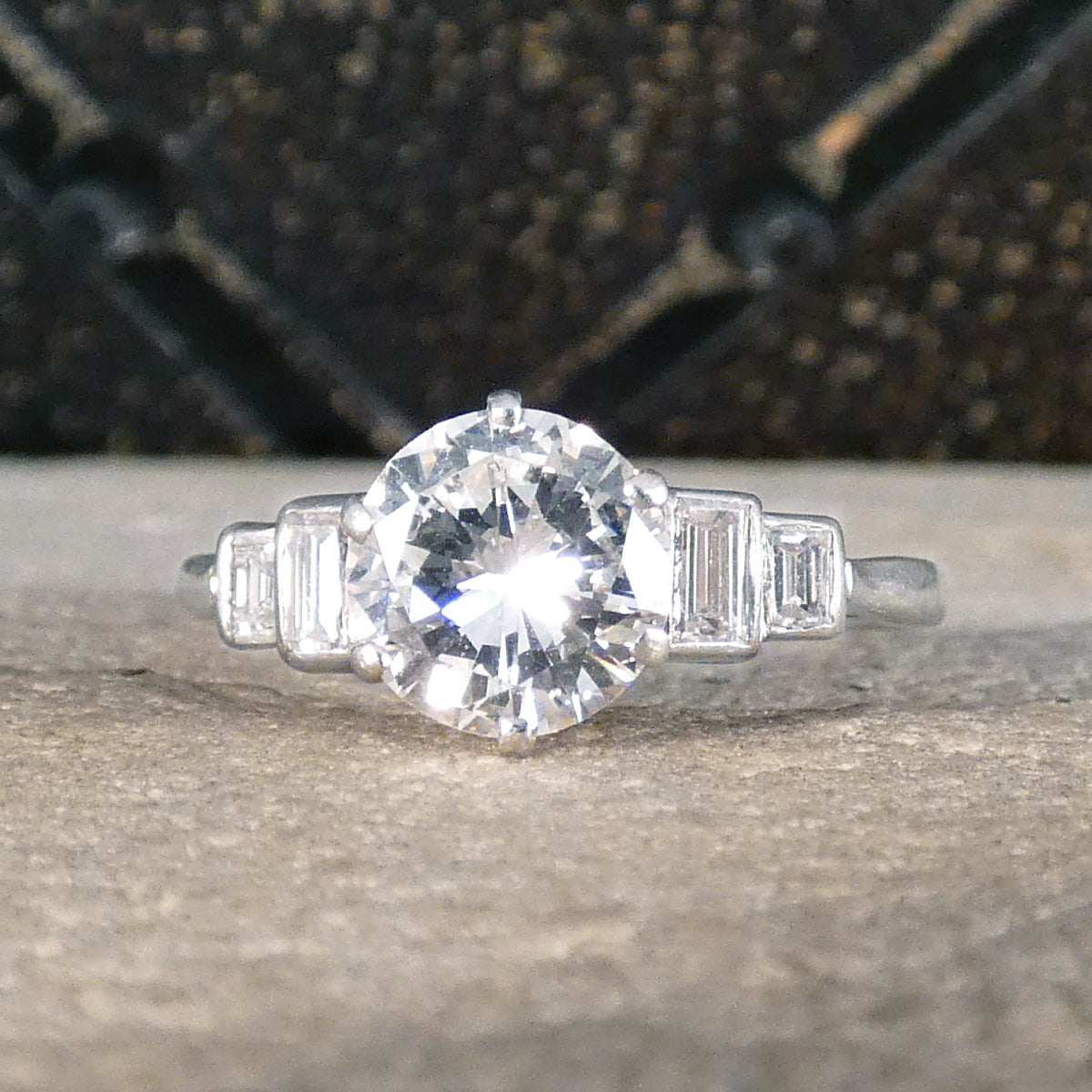 Art Deco 1.20ct Early Brilliant Cut Diamond Solitaire with Baguette Cut Shoulders in Platinum