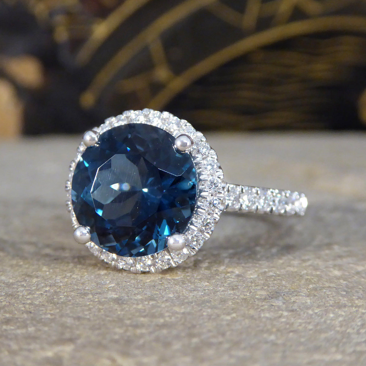 London Blue Topaz and Diamond Halo Cluster Ring in Platinum with Diamond set Shoulders