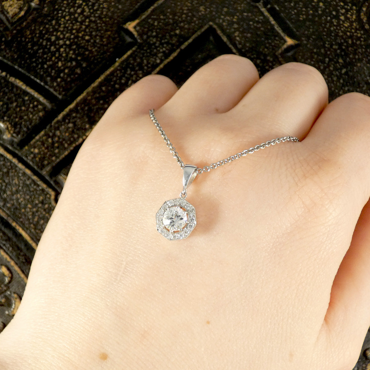 0.86ct Diamond Octagon Halo Cluster Pendant Necklace in Platinum shown on hand to see size ratio and sparkle.