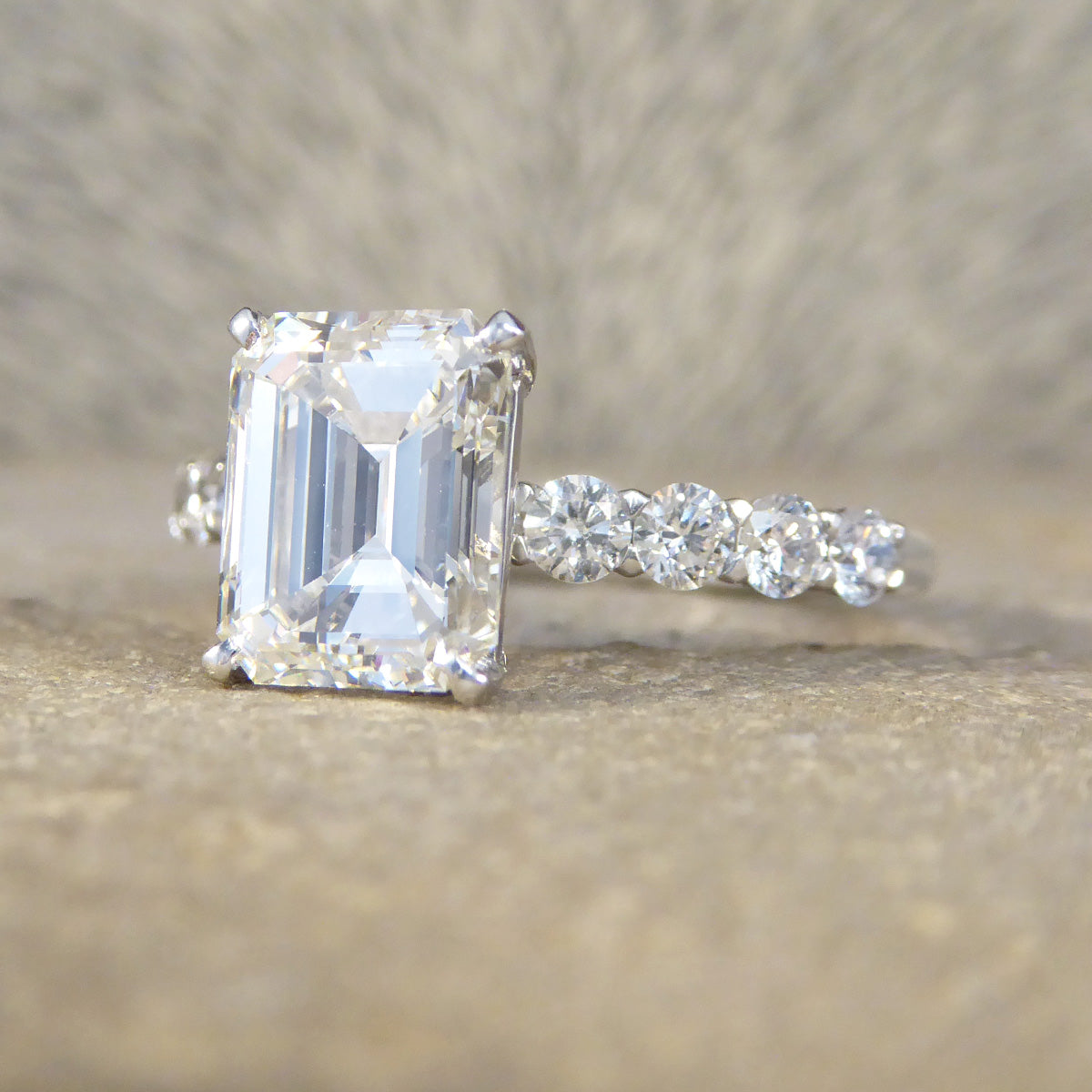 2.60ct Emerald Cut Diamond Solitaire Ring with 0.60ct Diamond Shoulders in Platinum