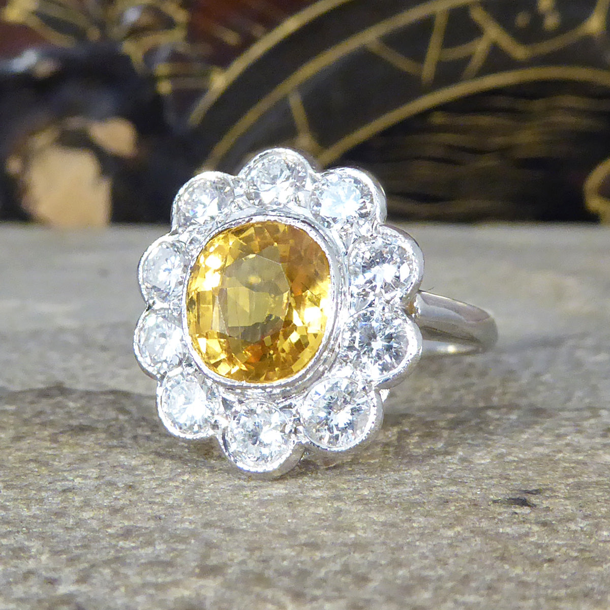 Bright and Rich 2.90ct Cushioned Oval Yellow Sapphire and 1.30ct Diamond Cluster Ring in Platinum