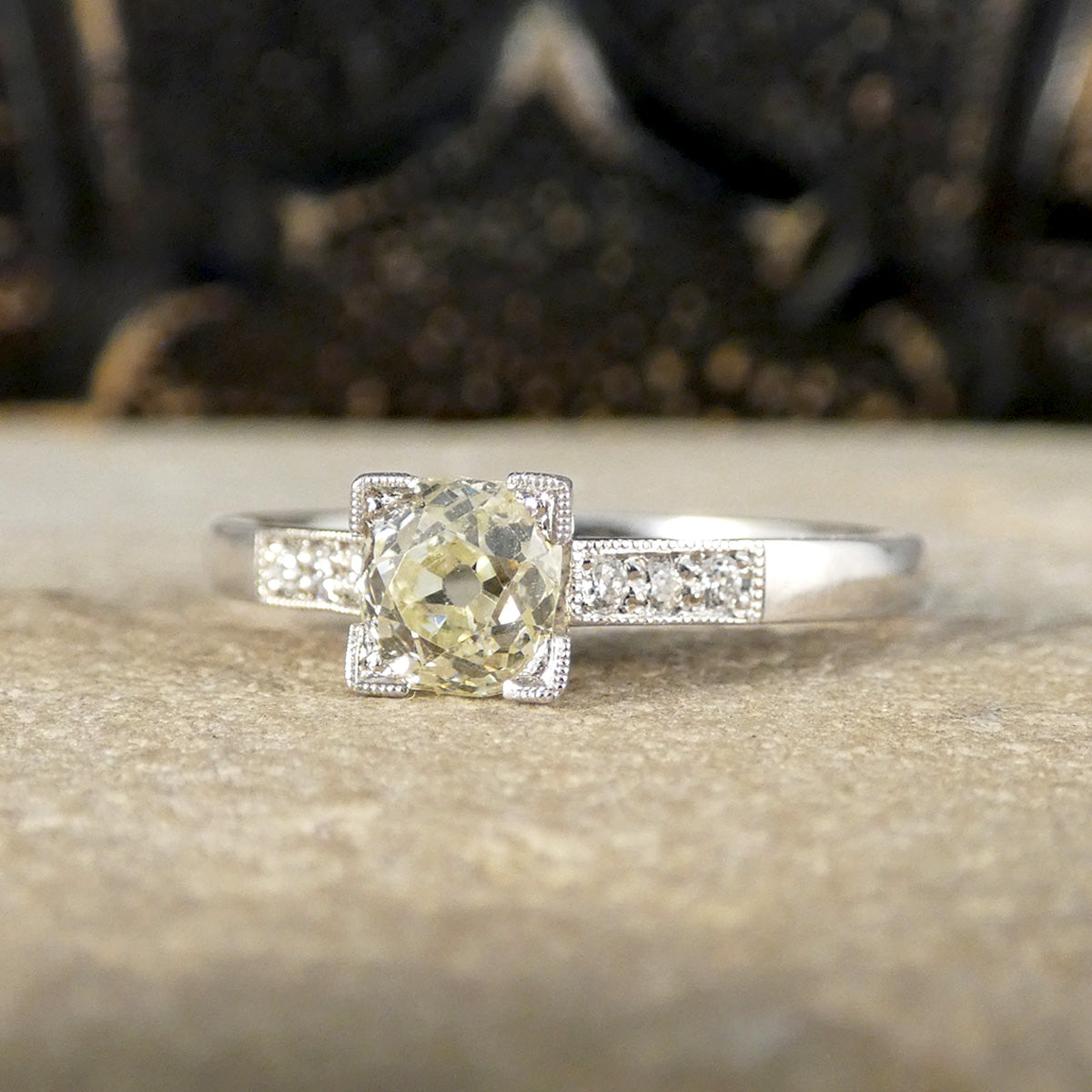 Champagne Old Cushion Cut Diamond Solitaire with Diamond set Shoulders in Platinum