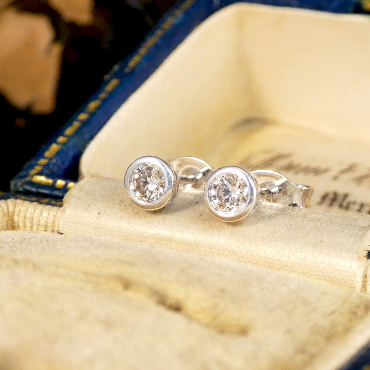 Bezel Set Diamond Stud Earrings in White Gold