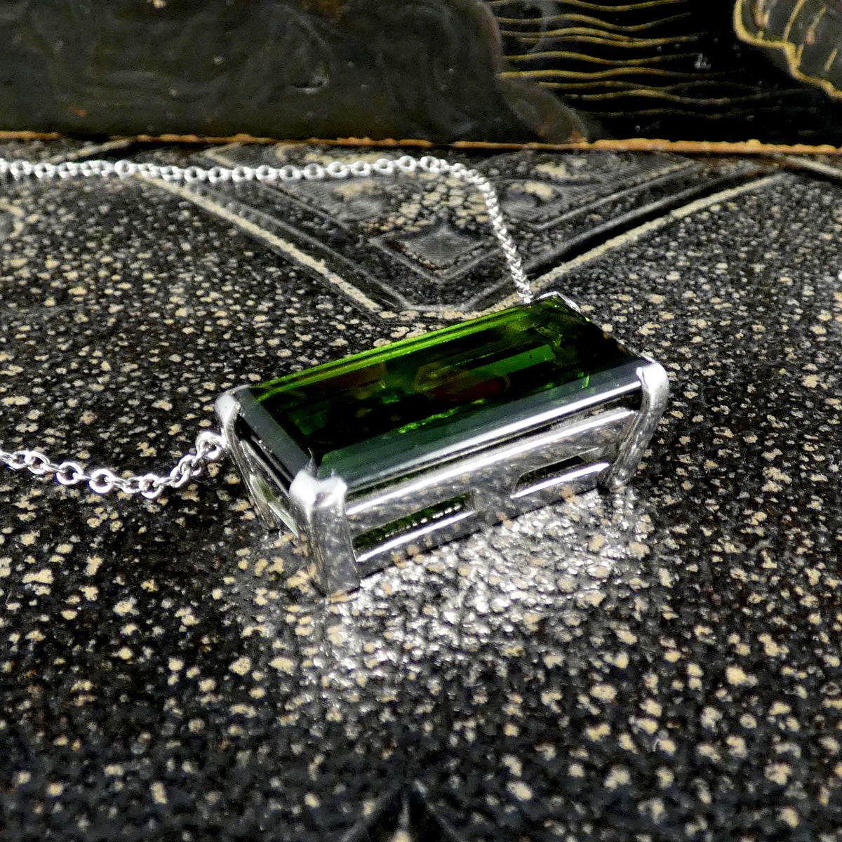 17.40ct Emerald Cut Green Tourmaline Eat West Set Pendant Necklace in 18ct White Gold. Shown in substantial and secure corner box setting.