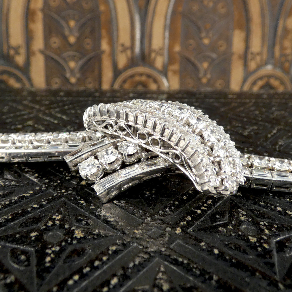 Close-up of the intricate gallery details on the 1950's French diamond bracelet, showcasing the precise craftsmanship and elegance of its 30 carats of diamonds.