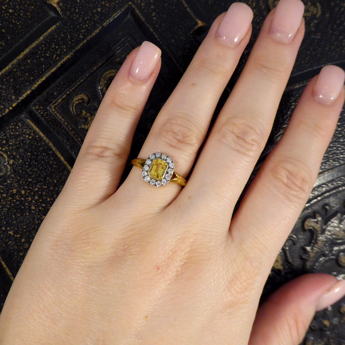 Georgian style cluster ring on the finger to see size guide and how it will look when worn on the ring finger.