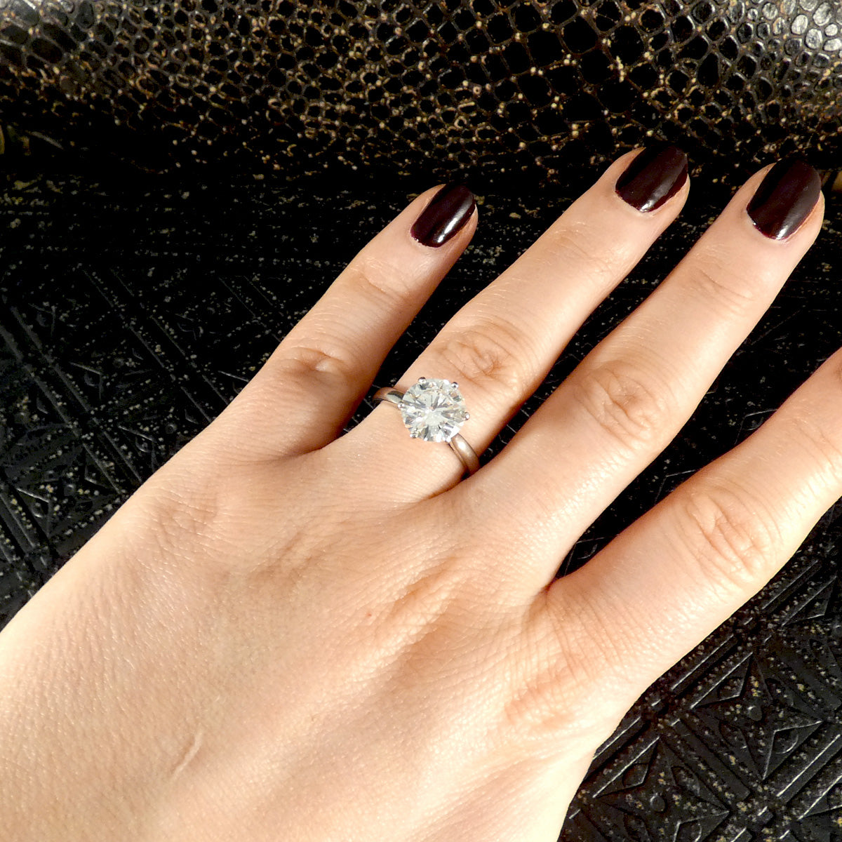 3.04ct Brilliant Cut Diamond solitaire engagement ring showcased on a hand, highlighting its elegant design and sparkle.