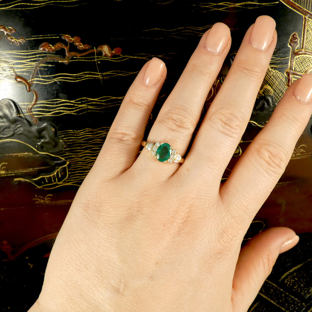 Vintage Emerald and Diamond Ring on the hand to show the size and ratio and piece in context. Beautiful and colourful.