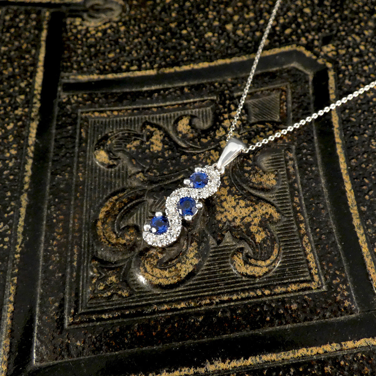 Ceylon Sapphire and Diamond Three Stone Lazy River Drop Pendant Necklace in Platinum