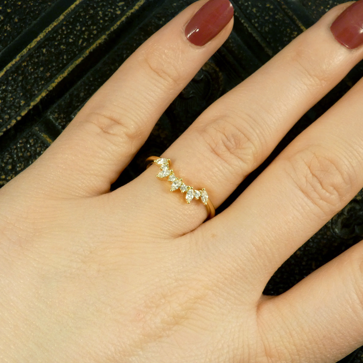 Alternating Marquise and Brilliant Cut Diamond Curved Crown in 18ct Yellow Gold. Showing ring worn on its own on the finger.