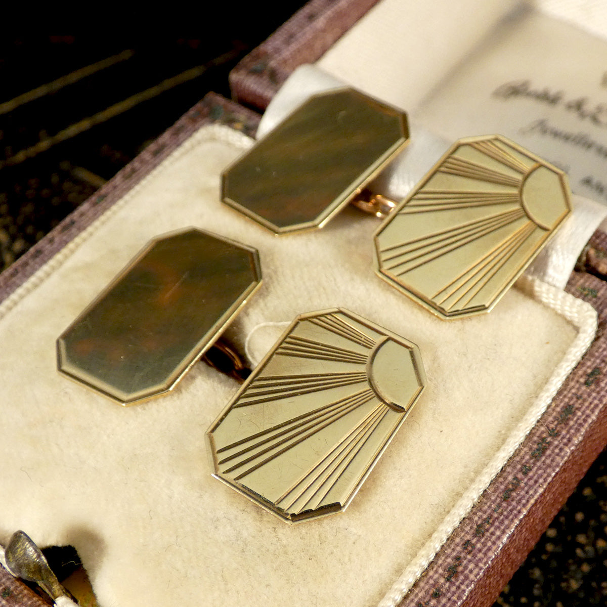 This final image displays the vintage gold cufflinks presented in vintage box, emphasising the Art Deco-inspired sunburst design and their immaculate condition. Perfect for adding timeless elegance to any formal attire.