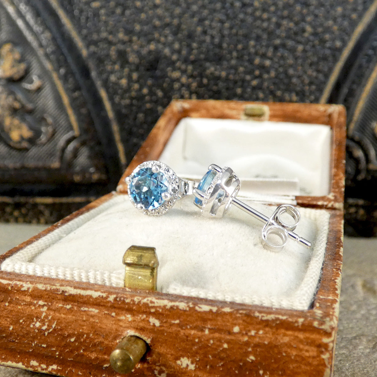 Blue Topaz and Diamond cluster earrings in 9ct white gold.