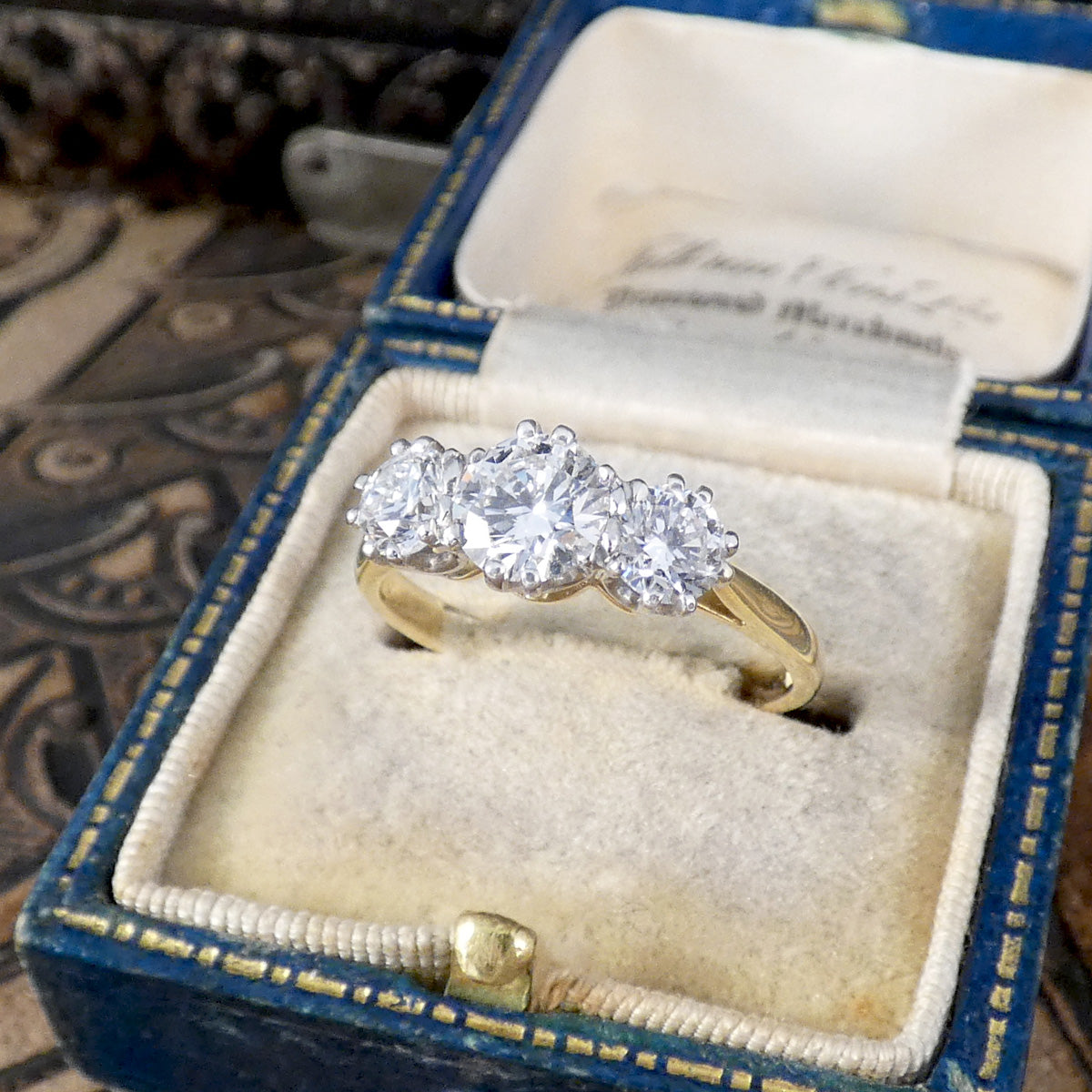 1.22ct Diamond Trilogy Three Stone Ring in 18ct Gold GIA Cert D and E Colour. The perfect engagement ring, representing past, present and future promise. Shown in a vintage box.