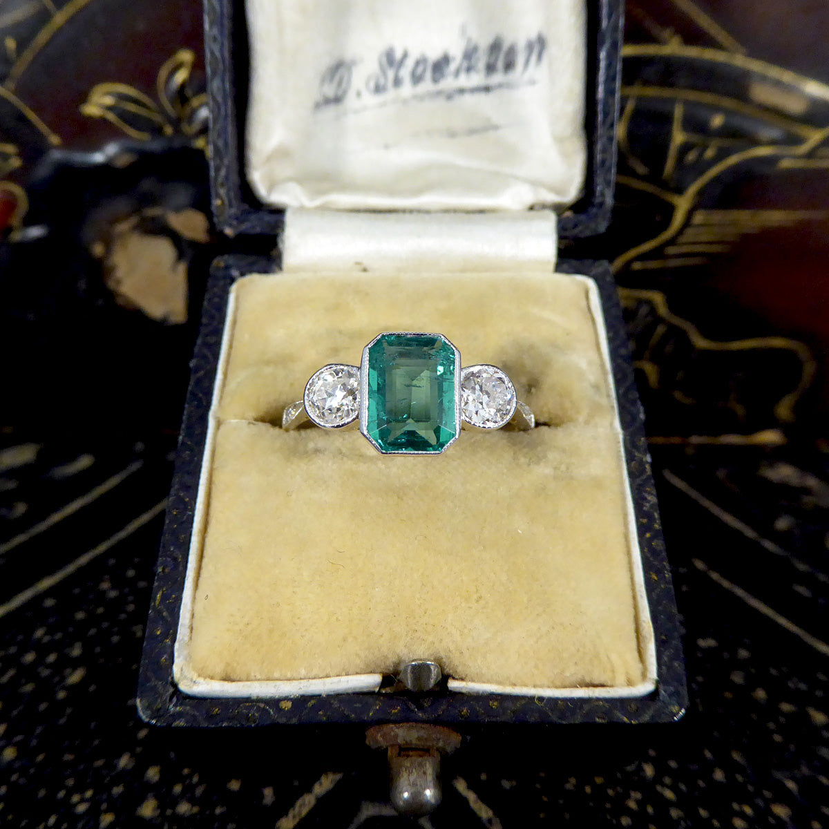 Contemporary Edwardian Style 1.30ct Emerald Cut Emerald and Diamond Three Stone Ring in 18ct Gold