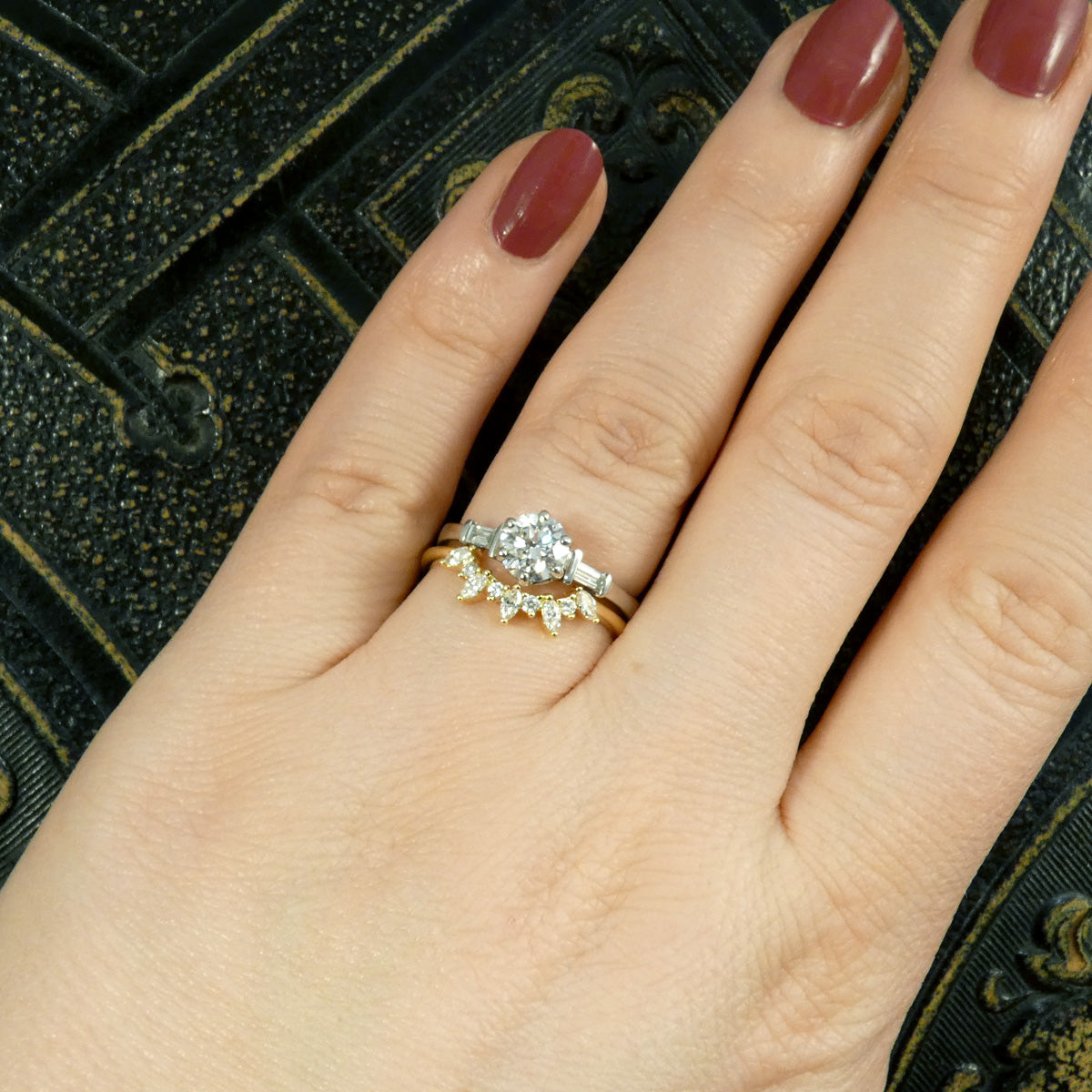 Alternating Marquise and Brilliant Cut Diamond Curved Crown in 18ct Yellow Gold. Paired with engagement ring to show used as a curved crown wedding ring.