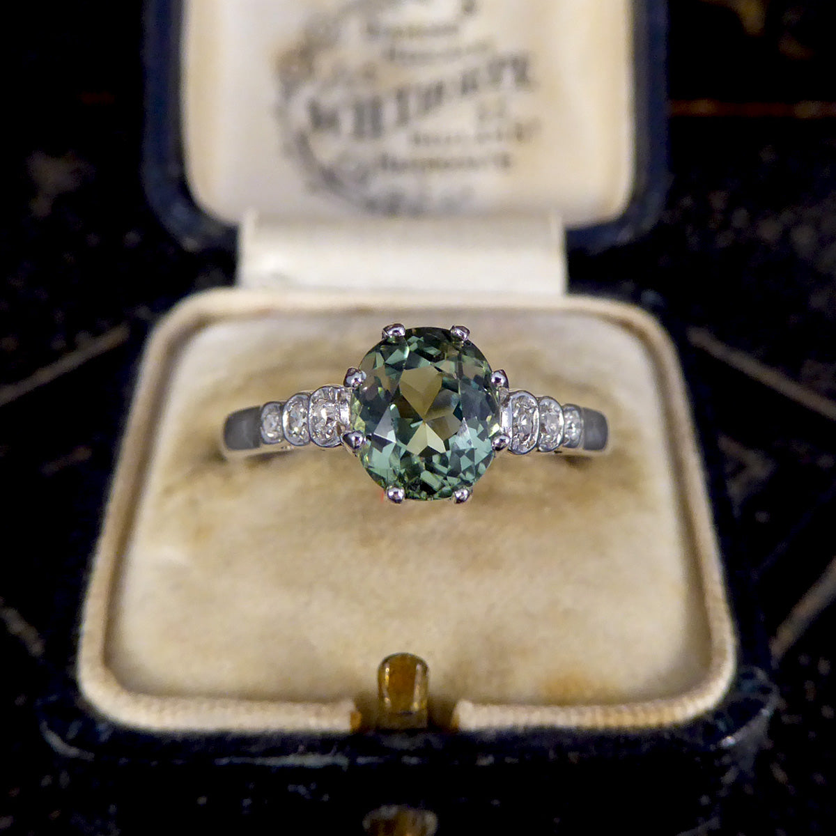 Enchanting Green Tourmaline Ring with Diamond Shoulders in 18ct White Gold