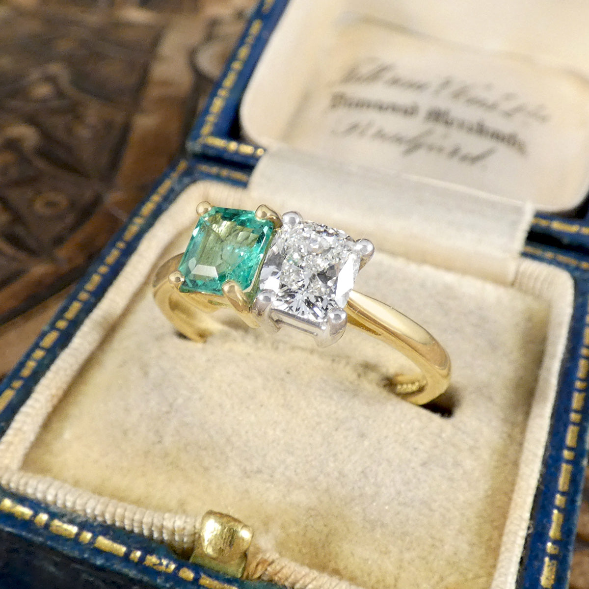 GIA Cushion Cut Diamond and Emerald Toi et Moi Ring in 18ct Yellow Gold and Platinum. Displayed in vintage box.