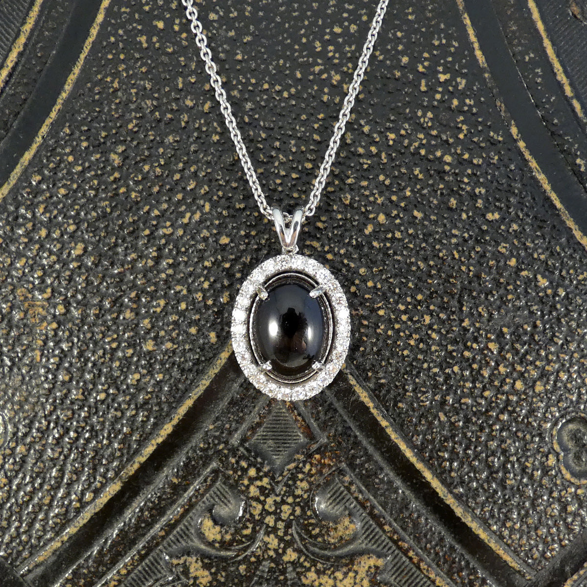 Cabochon Garnet and Diamond Halo Pendant Necklace in 18ct White Gold