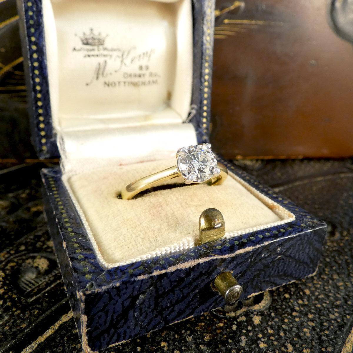 Diamond solitaire ring in a ring box to see for size and view of how it could appear in a proposal.